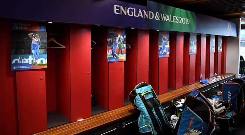 Indian players' pictures are displayed inside the dressing room