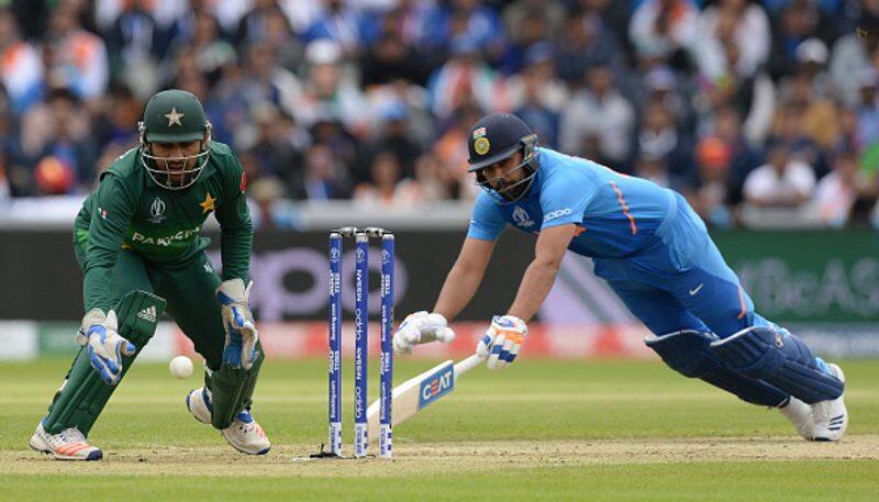 Earlier, Rohit survived two run out chances. Here, he is seen diving back to his crease to avoid being run out