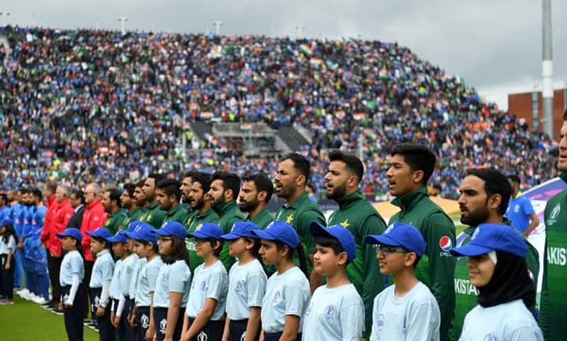 Pakistan players line up before the start of the match