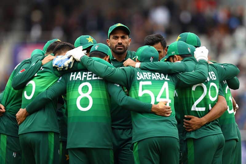 Pakistan players in a huddle before the start of India innings
