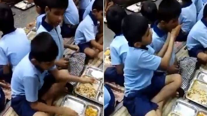 Video of a school boy feeding his differently abled friend goes viral wins hearts Video of a school boy feeding his differently abled friend goes viral wins hearts