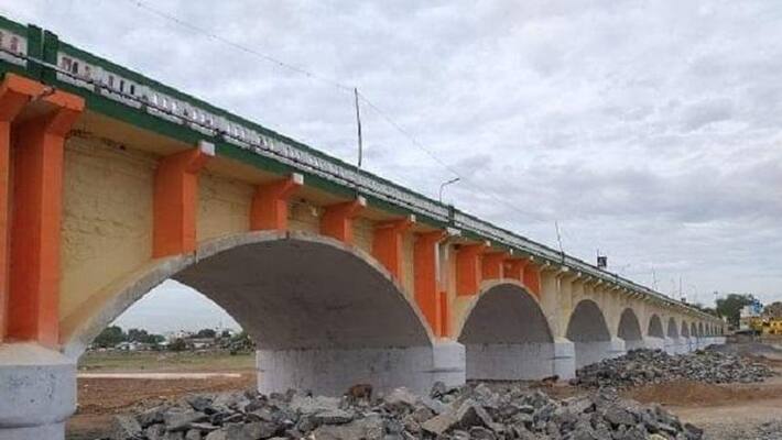 maduri albert victor Bridge in saffron colour maduri albert victor Bridge in saffron colour