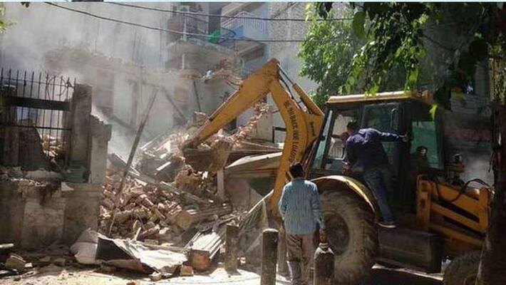 illegal building constructions destroying in tadepalligudem illegal building constructions destroying in tadepalligudem