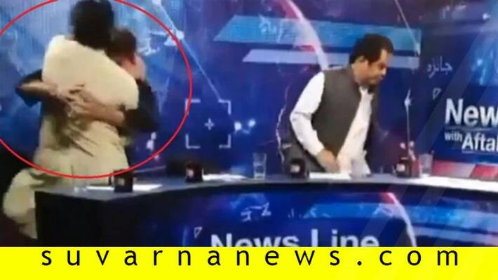 TV debate in Pakistan turns into wrestling match as PTI leader rains blows on journalist TV debate in Pakistan turns into wrestling match as PTI leader rains blows on journalist
