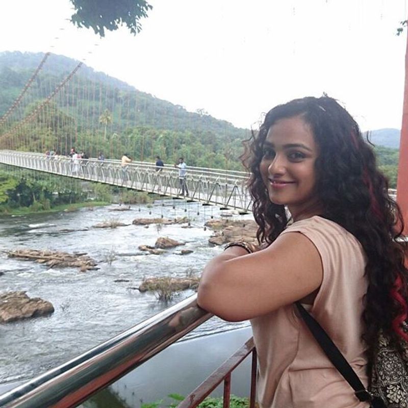 Actress Nithya Menon's Dark Look Photos