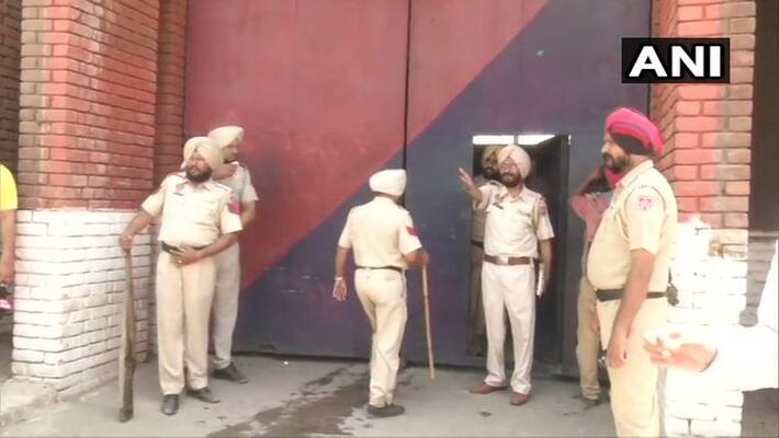 Several injured as clash breaks out at Ludhiana jail; cops fire in air Several injured as clash breaks out at Ludhiana jail; cops fire in air