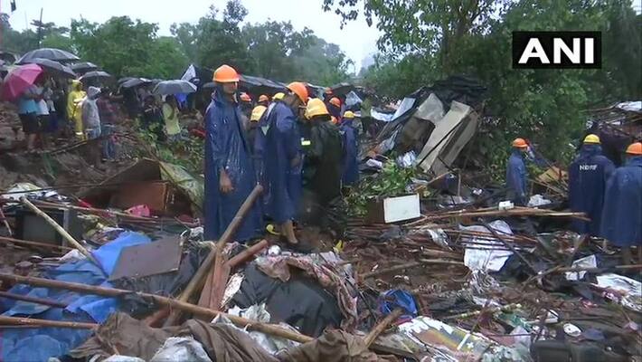 Thirteen killed after a compound wall crashed in Mumbai Thirteen killed after a compound wall crashed in Mumbai