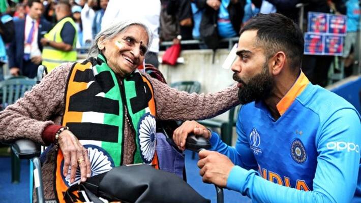 virat kohli assures to old lady fan for ticket virat kohli assures to old lady fan for ticket
