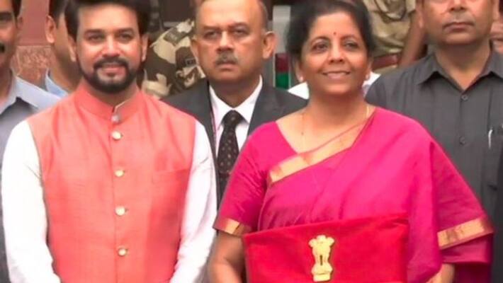 nirmala sitharaman parents arrives parliament to watch budget speech nirmala sitharaman parents arrives parliament to watch budget speech