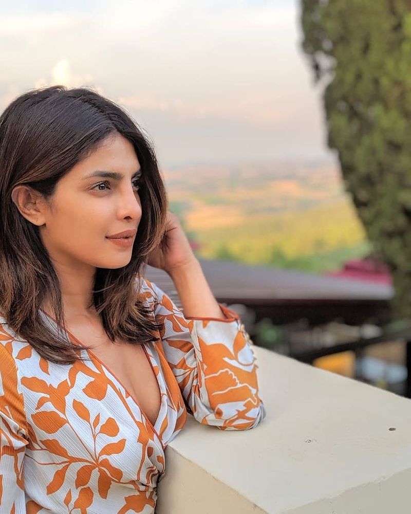 Photos of Priyanka Chopra posing in a glamorous swimming pool