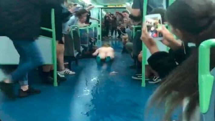 Metro condemns passenger who slid naked through Melbourne train Metro condemns passenger who slid naked through Melbourne train