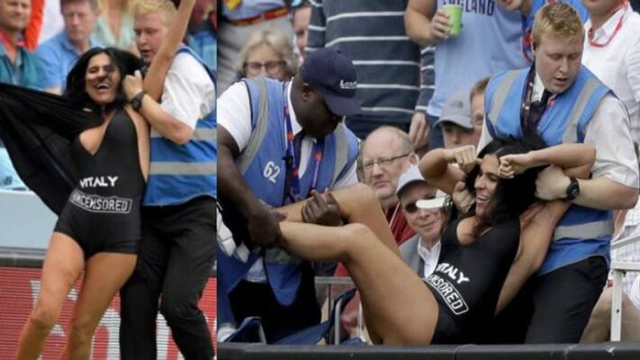 woman tried to advertise porn site in world cup final disposed by securities woman tried to advertise porn site in world cup final disposed by securities