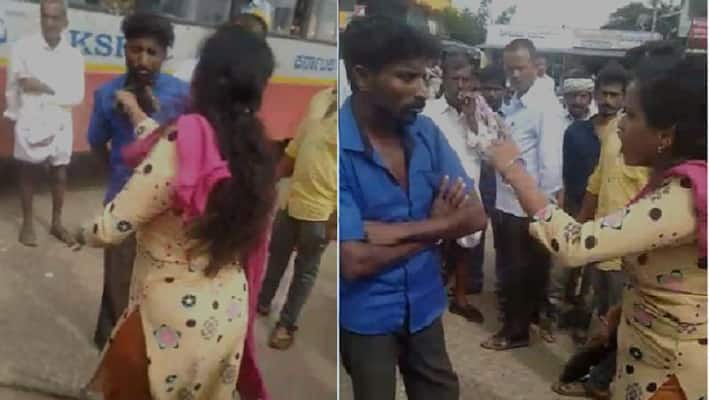 Woman beats up a person for cheating at Davanagere Woman beats up a person for cheating at Davanagere