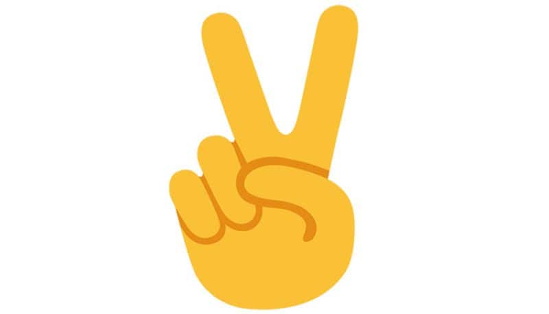 What you think: A peace emoji or an emoji that says, “Two please.”  What it actually means: The emoji represents victory.