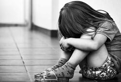 school girl  was raped by a middle aged man and she give birth to a dead baby in school premises