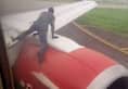 Nigeria Man attempts climb taxiing aircraft apprehended
