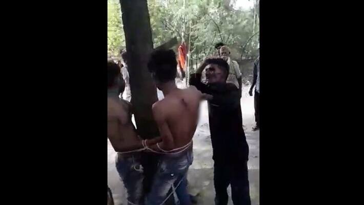 Talibani sentenced to two young men tied to trees in the name of theft, villagers made video viral Talibani sentenced to two young men tied to trees in the name of theft, villagers made video viral