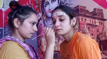 Youth made moon mission tattoo on head and face in varanasi uttar pradesh