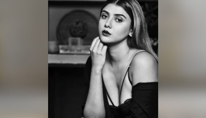 actress Parno mitra flaunts her cleavage in white bikini photos gone viral on social Media BRd