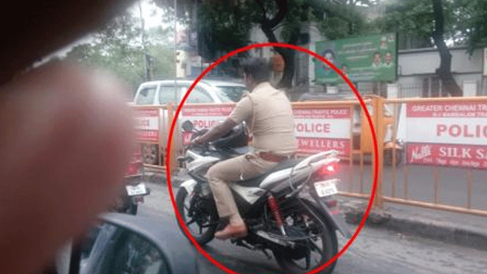 helmet while driving...police suspend helmet while driving...police suspend