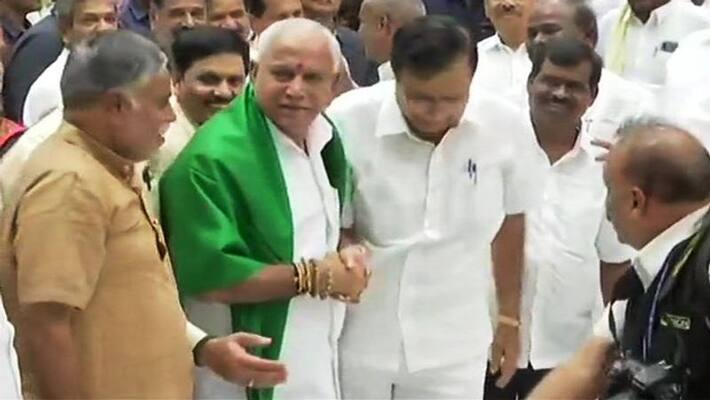 Yediyurappa takes oath as CM; Congress, JD (S) to boycott ceremony Yediyurappa takes oath as CM; Congress, JD (S) to boycott ceremony