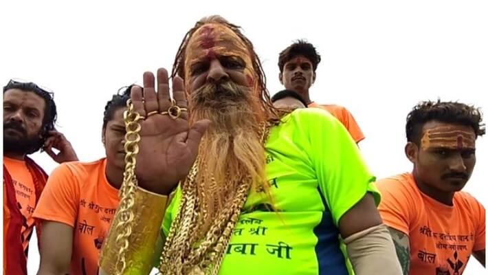 golden baba seen in kavad mela with 13 kilos of gold on body golden baba seen in kavad mela with 13 kilos of gold on body