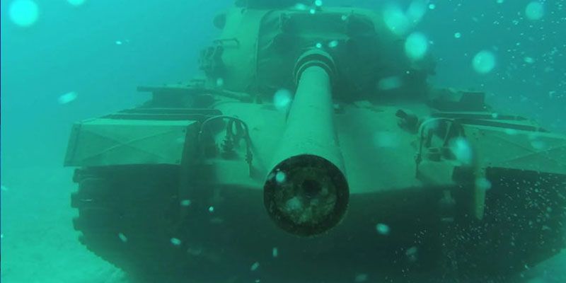 You can now swim among tanks at Jordan's underwater military museum