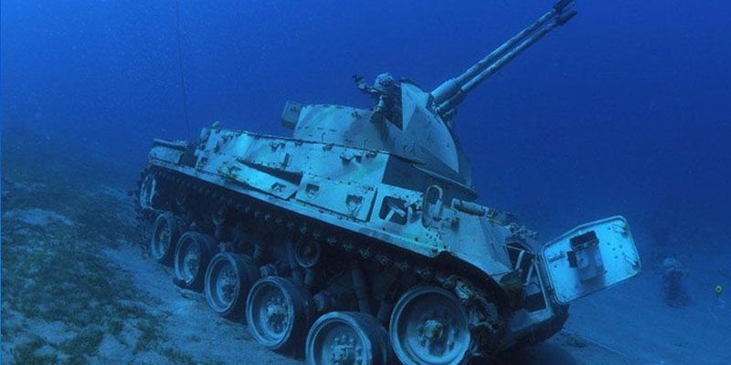 You can now swim among tanks at Jordan's underwater military museum