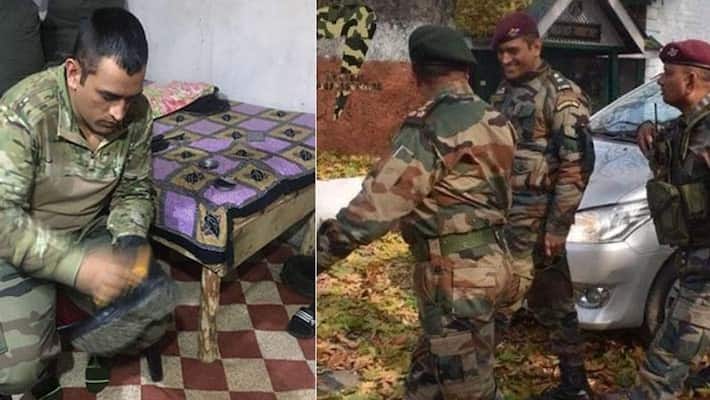 Dhoni playing vollyball with army, and polish his shoes video viral on social media Dhoni playing vollyball with army, and polish his shoes video viral on social media