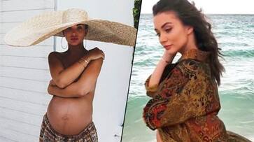 Amy Jackson goes topless; 33-weeks pregnant actress flaunts baby bump