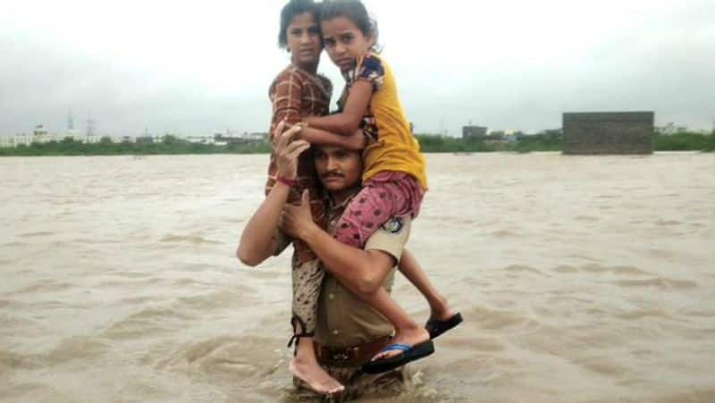 Torrential rains have led to building collapses in Gujarat. As many as 16 people have lost their lives due to building or wall collapses. The death toll in the state has gone up to 19. Chief minister Vijay Rupani held a review meeting and said that seventeen dams are overflowing in the state.
