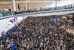 Hong Kong's airport shut down after thousands intensify protest