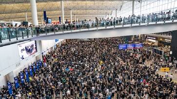 Hong Kong's airport shut down after thousands intensify protest