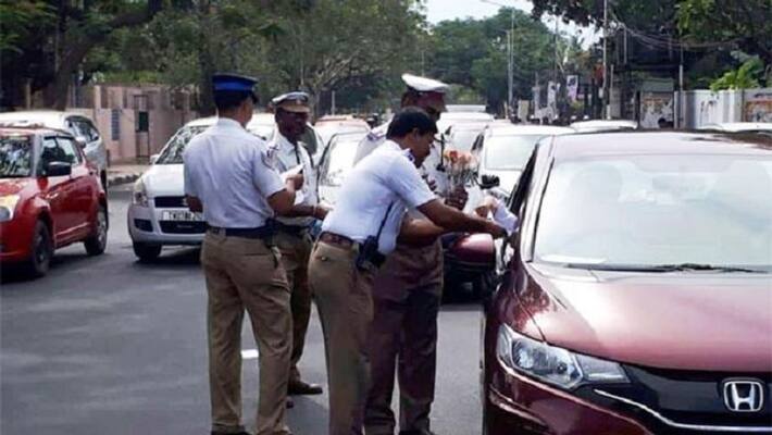 traffic police fined car owner for not wearing helmet in chennai traffic police fined car owner for not wearing helmet in chennai
