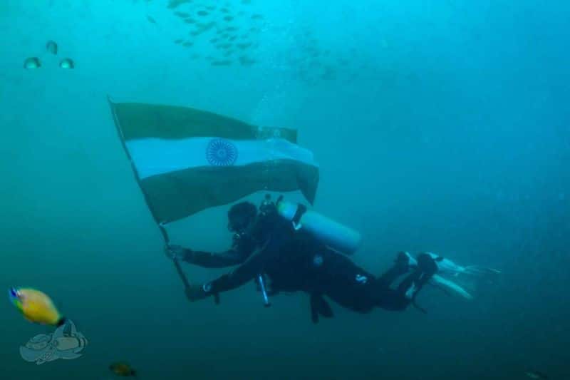 Pondicherry diving instructors hoist national flag 60 feet under water