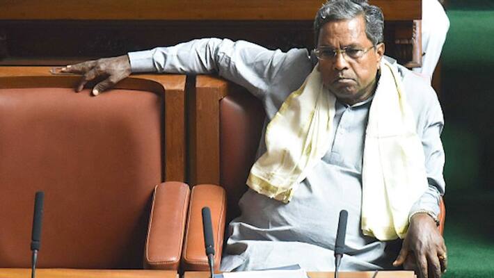 Karnataka sex for favours scandal: Cong seeks rape case against ex-minister, resignation of 6 ministers-dnm Karnataka sex for favours scandal: Cong seeks rape case against ex-minister, resignation of 6 ministers-dnm