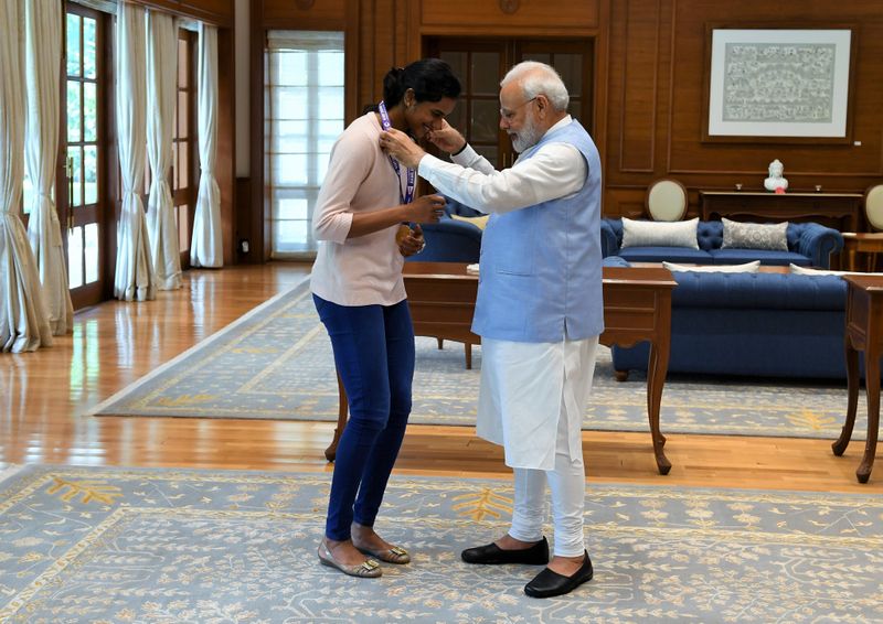 Pm narendra modi congratulate world badminton championship pv sindhu