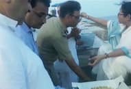 IPS officer touches West Bengal CM Mamata Banerjees feet as she feeds cake