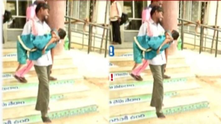 man carrying Daughter's dead body on hand after being denied govt help in karimnagar man carrying Daughter's dead body on hand after being denied govt help in karimnagar
