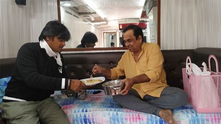 Star comedian Brahmanandam share lunch box with Harish Shankar Star comedian Brahmanandam share lunch box with Harish Shankar