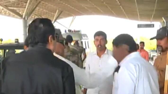 Congress leader and Karnataka's former Chief Minister Siddaramaiah slaps his aide outside Mysuru Airport