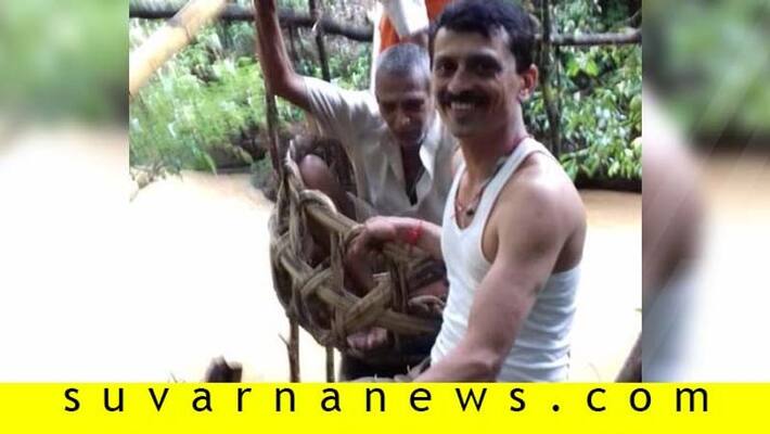Priest Carried in Hamper As Bridge Submerges in Uttara Kannada Priest Carried in Hamper As Bridge Submerges in Uttara Kannada