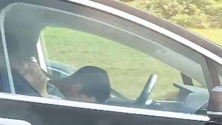 Tesla driver appears to be asleep in moving car Video goes viral Tesla driver appears to be asleep in moving car Video goes viral