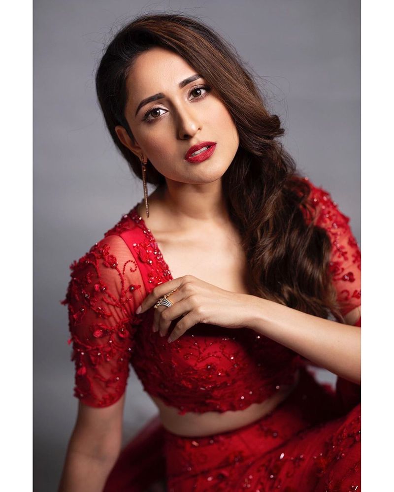 Pragya Jaiswal beautiful poses in red dress
