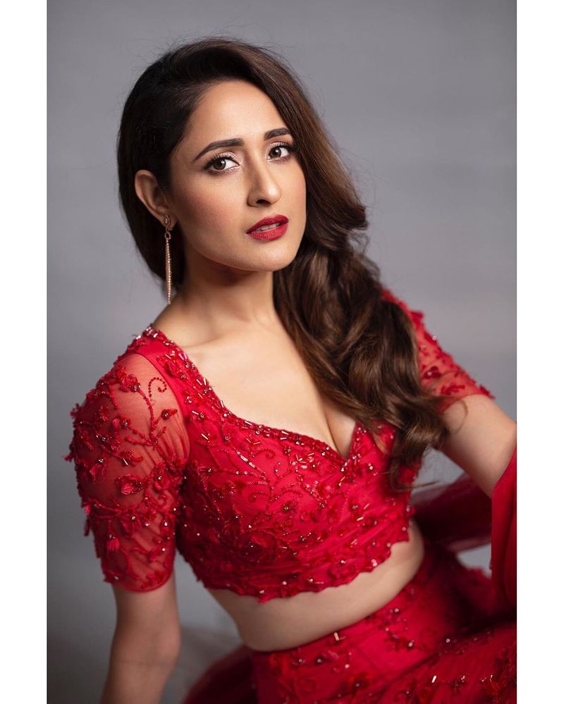 Pragya Jaiswal beautiful poses in red dress