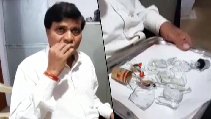 This man eats glass pieces for fun and has been doing so since last 45 years This man eats glass pieces for fun and has been doing so since last 45 years