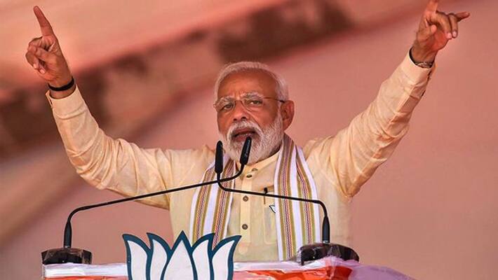 A book which presents Modi's life story through photographs A book which presents Modi's life story through photographs