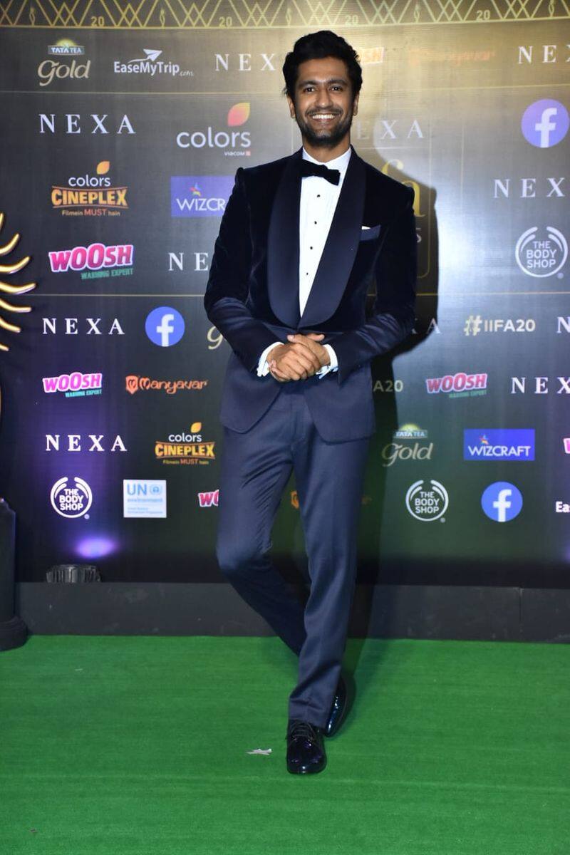 Vicky Kaushal walked the green carpet looking dapper in a white shirt, black blazer and matching pants coupled with formal shoes to finish off his look.