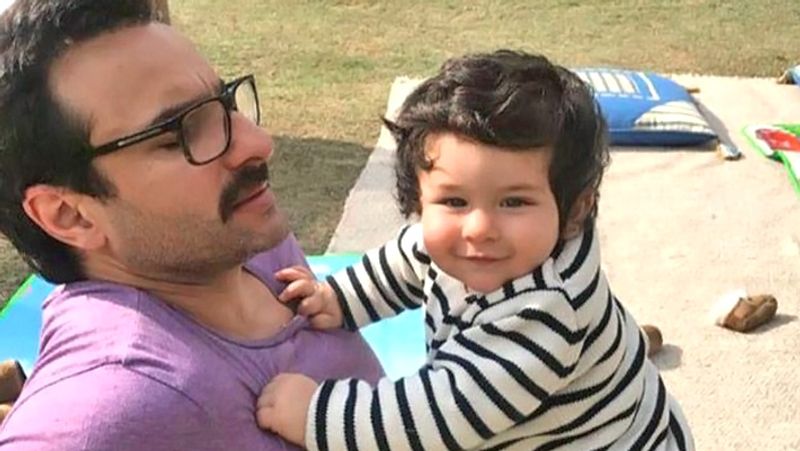 पापा सैफ के साथ मस्ती के मूड में तैमूर।