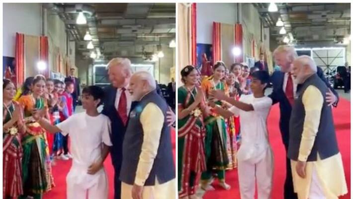 On Howdy Modi event Donald Trump and Narendra Modi pose for selfie with a kid On Howdy Modi event Donald Trump and Narendra Modi pose for selfie with a kid